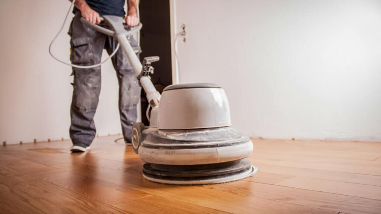Commercial Oiling in Kent – engineered oak hardwood floor being buffed with a rotary machine to achieve a smooth, polished surface.